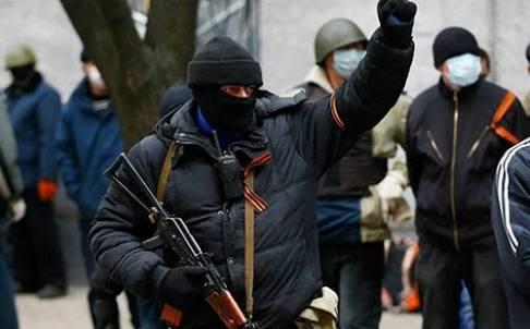 Eastern Ukrainian folk armed with St. George's ribbon